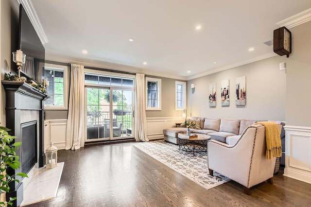 2700 N Wayne Ave Unit 2N, Chicago, IL 60614 - living room featuring a decorative wall, crown molding, dark wood finished floors, plenty of natural light, and a fireplace