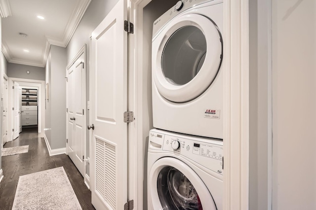 2700 N Wayne Ave Unit 2N, Chicago, IL 60614 - laundry room with stacked washer / drying machine, ornamental molding, dark wood-style flooring, baseboards, and recessed lighting
