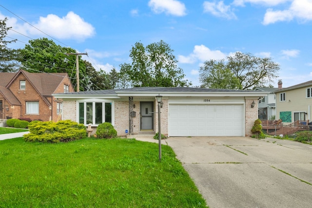 1094 E Algonquin Rd, Des Plaines, IL 60016 - view of front of home featuring brick siding, driveway, a garage, and a front yard