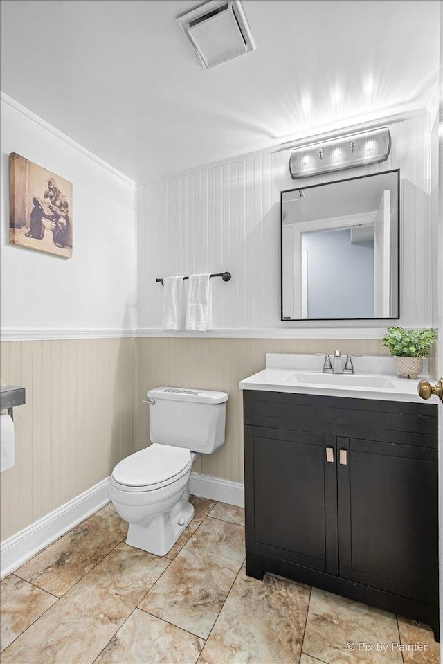 688 Regent Dr, Crystal Lake, IL 60014 - bathroom with vanity and a wainscoted wall