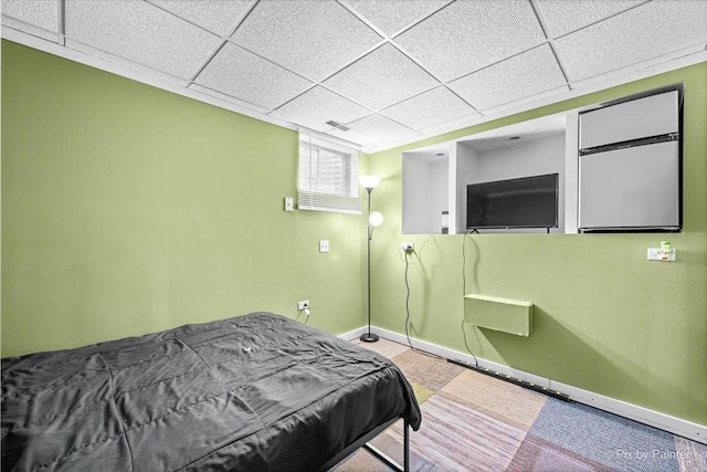 688 Regent Dr, Crystal Lake, IL 60014 - carpeted bedroom with baseboards and a paneled ceiling