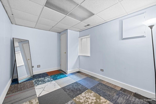 688 Regent Dr, Crystal Lake, IL 60014 - below grade area featuring a paneled ceiling and wood finished floors