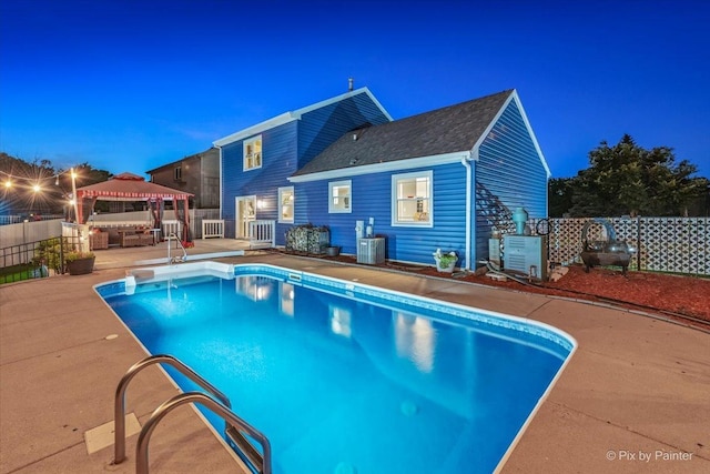 688 Regent Dr, Crystal Lake, IL 60014 - view of swimming pool with a gazebo, a fenced backyard, and a patio