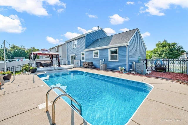 688 Regent Dr, Crystal Lake, IL 60014 - view of swimming pool with a gazebo, a fenced backyard, and a patio area