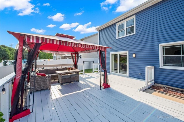 688 Regent Dr, Crystal Lake, IL 60014 - deck with a gazebo, outdoor lounge area, and a fenced backyard