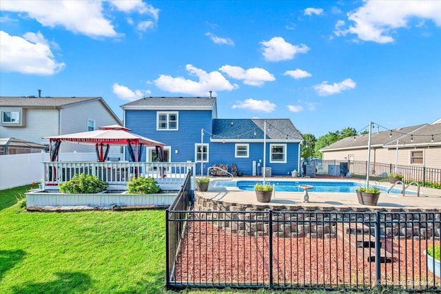 688 Regent Dr, Crystal Lake, IL 60014 - rear view of house featuring a gazebo, a wooden deck, a shingled roof, and a patio