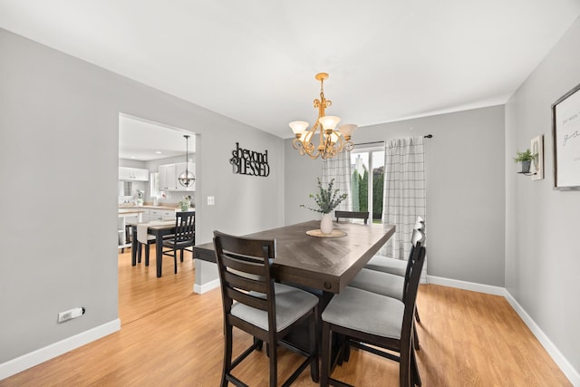 2278 Andrew Trl, Montgomery, IL 60538 - dining area with light wood-style floors and a chandelier