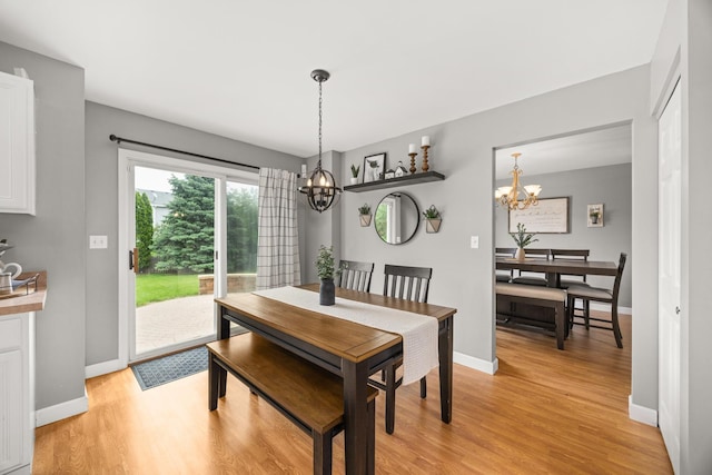 2278 Andrew Trl, Montgomery, IL 60538 - dining area featuring a chandelier and light wood-style floors