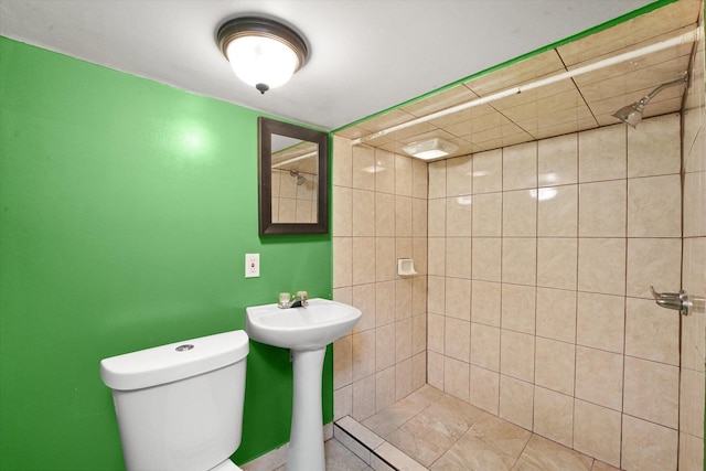 2203 Gilead Ave, Zion, IL 60099 - bathroom featuring tiled shower and toilet