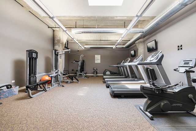 3963 W Belmont Ave Unit 422, Chicago, IL 60618 - exercise room featuring baseboards and carpet flooring