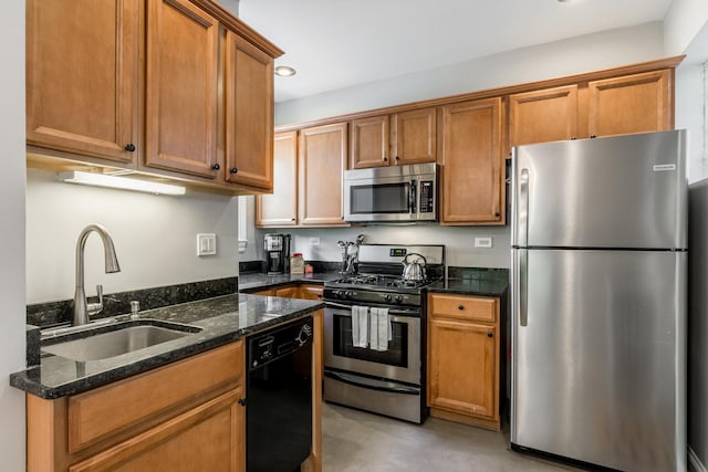 3608 W Dickens Ave Unit 1W, Chicago, IL 60647 - kitchen featuring stainless steel appliances, a sink, dark stone countertops, brown cabinets, and recessed lighting