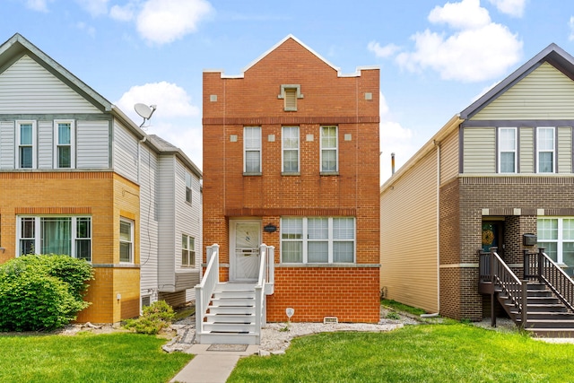 6941 S E End Ave, Chicago, IL 60649 - multi unit property featuring brick siding and a front yard