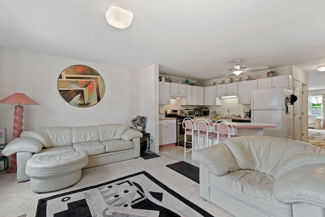 6941 S E End Ave, Chicago, IL 60649 - living room featuring ceiling fan and light carpet