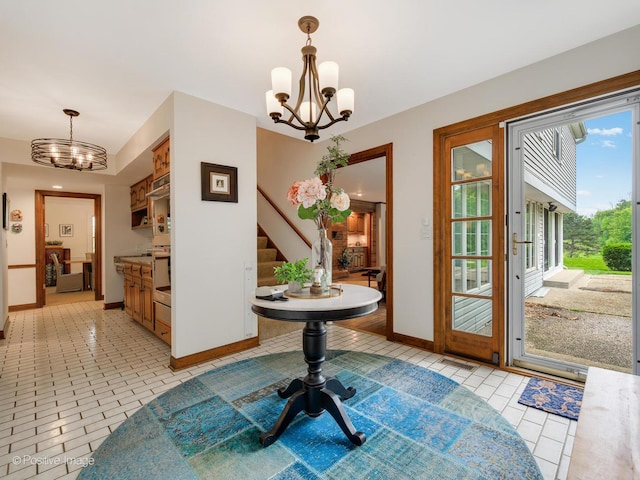 77 Mark Dr, Hawthorn Woods, IL 60047 - hall with a chandelier, stairway, and light tile patterned floors