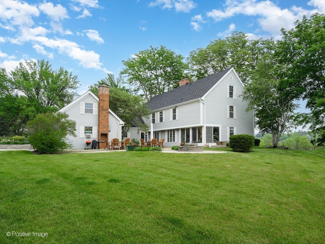 77 Mark Dr, Hawthorn Woods, IL 60047 - rear view of house featuring a patio area and a lawn