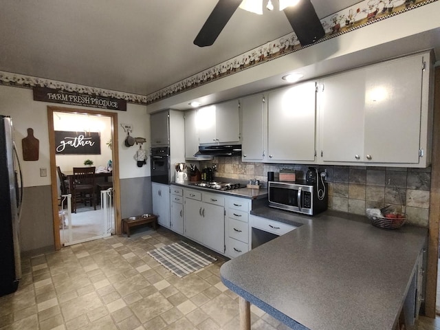 205 Beacon Dr, Belvidere, IL 61008 - kitchen with black appliances, dark countertops, ventilation hood, backsplash, and ceiling fan