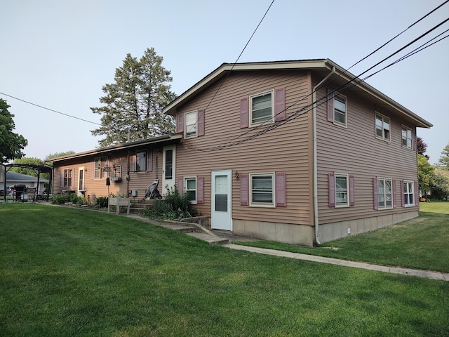 205 Beacon Dr, Belvidere, IL 61008 - view of front facade with a front yard