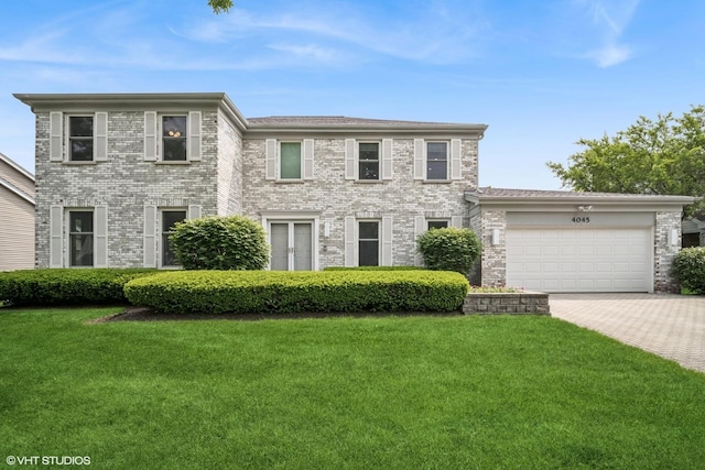 4045 N Harvard Ave, Arlington Heights, IL 60004 - colonial inspired home featuring a garage, a front yard, and driveway