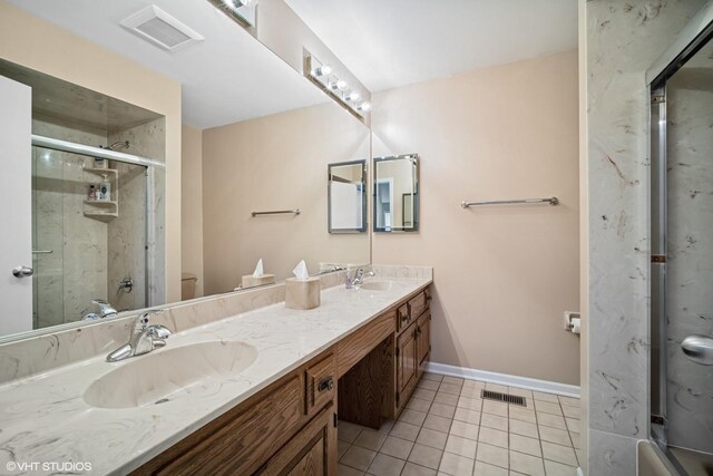 4045 N Harvard Ave, Arlington Heights, IL 60004 - full bath with double vanity, toilet, tile patterned floors, an enclosed shower, and baseboards