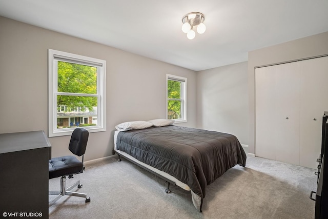 4045 N Harvard Ave, Arlington Heights, IL 60004 - carpeted bedroom with a closet, baseboards, and a desk