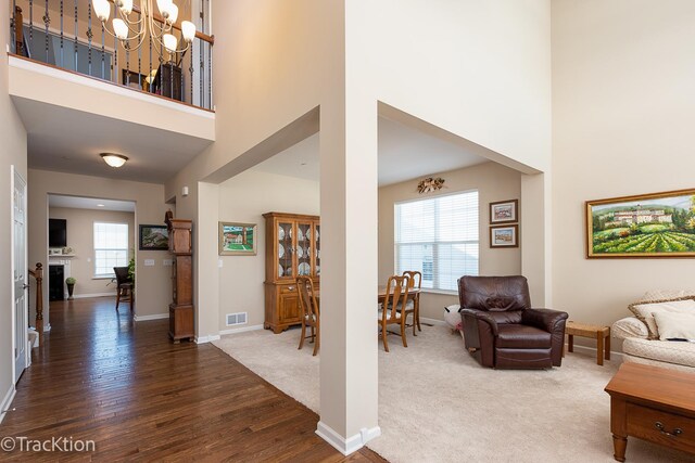 1878 Roseland Ln, Hoffman Estates, IL 60192 - entrance foyer with a high ceiling, a chandelier, and wood finished floors