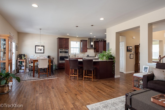 1878 Roseland Ln, Hoffman Estates, IL 60192 - living area with dark wood-style flooring and recessed lighting