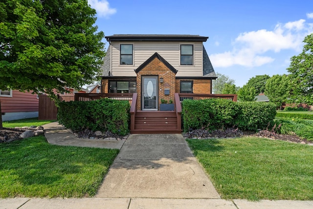 592 E 13th St, Lockport, IL 60441 - view of front of property with brick siding and a front lawn