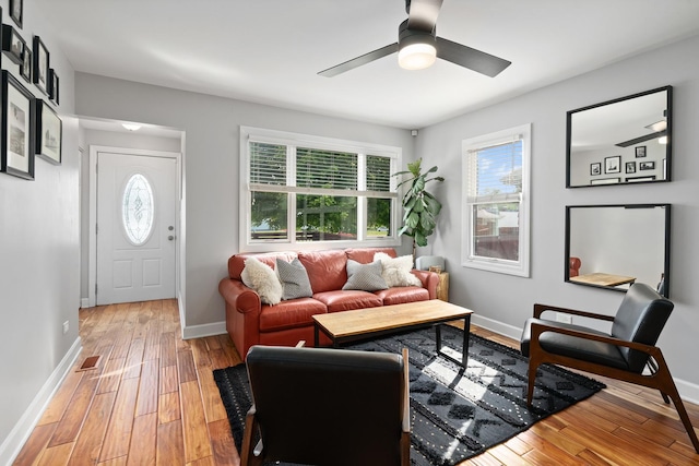 592 E 13th St, Lockport, IL 60441 - living room featuring light wood-style floors and a ceiling fan