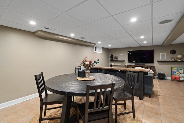 592 E 13th St, Lockport, IL 60441 - dining room with light tile patterned floors, recessed lighting, and a paneled ceiling
