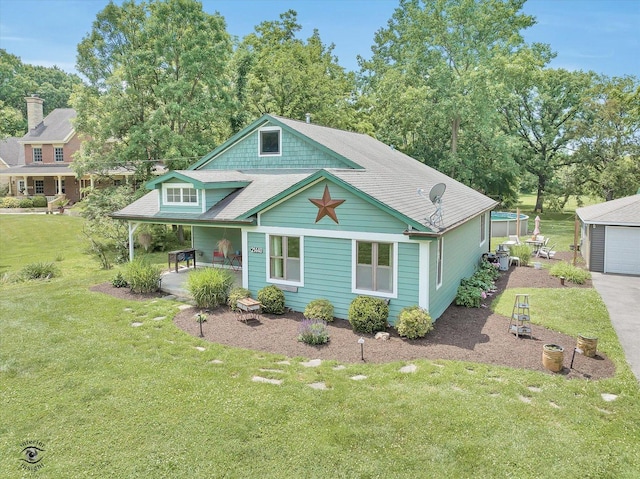 21440 S Hillside Rd, Frankfort, IL 60423 - view of front of home with a front yard, a porch, and view of scattered trees