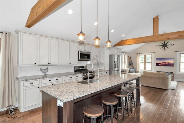 21440 S Hillside Rd, Frankfort, IL 60423 - kitchen featuring stainless steel appliances, dark wood-type flooring, recessed lighting, open floor plan, and a center island with sink