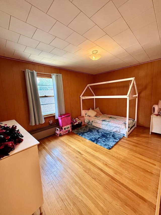 1308 Waverly Pl, Joliet, IL 60435 - bedroom featuring wood finished floors and wooden walls