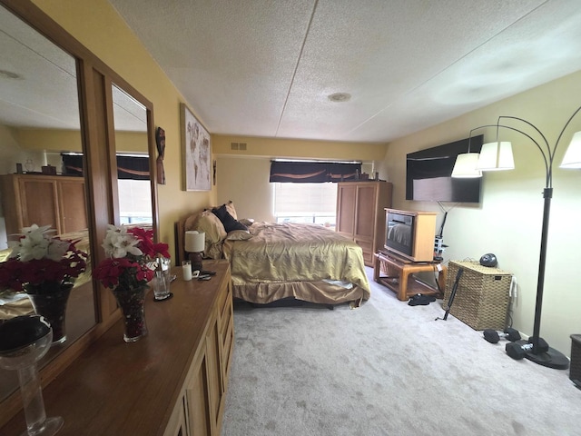 500 Park Ave Unit 329, Calumet City, IL 60409 - carpeted bedroom with a textured ceiling
