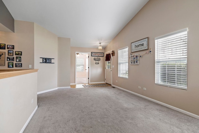 524 Prairie View Dr, Minooka, IL 60447 - carpeted entrance foyer featuring healthy amount of natural light and lofted ceiling
