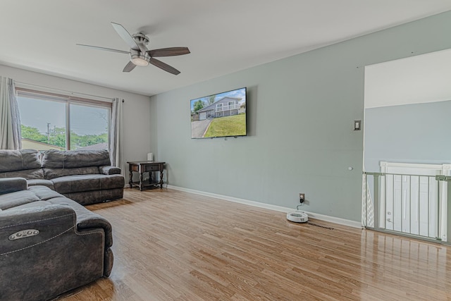 1006 Tacoma St, Carpentersville, IL 60110 - living room with ceiling fan, wood finished floors, and baseboards
