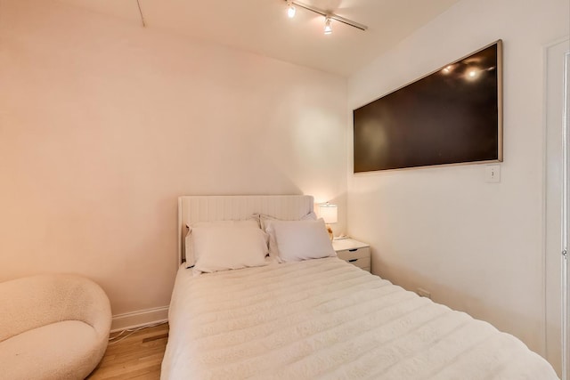 606 W Aldine Ave Unit 3E, Chicago, IL 60657 - bedroom with wood finished floors and baseboards