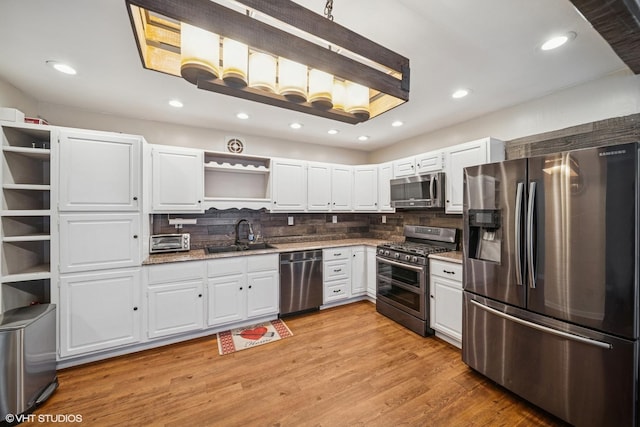 9540 S Mayfield Ave Unit 103S, Oak Lawn, IL 60453 - kitchen featuring appliances with stainless steel finishes, open shelves, white cabinets, and recessed lighting