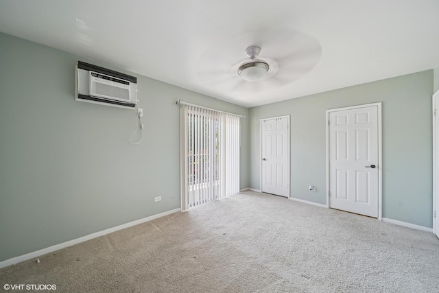 9540 S Mayfield Ave Unit 103S, Oak Lawn, IL 60453 - unfurnished bedroom featuring a wall unit AC, carpet flooring, and ceiling fan