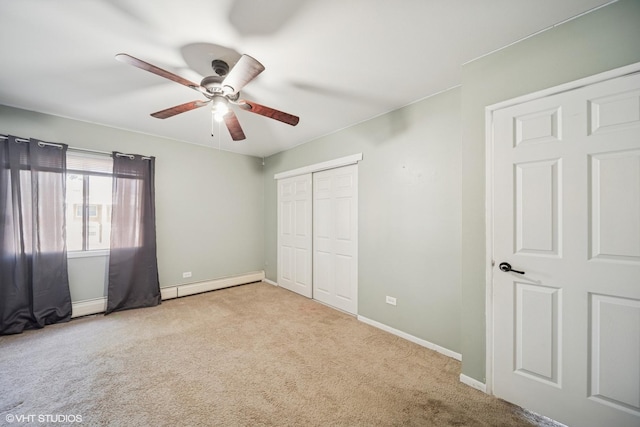 9540 S Mayfield Ave Unit 103S, Oak Lawn, IL 60453 - unfurnished bedroom with baseboard heating, carpet flooring, a closet, and a ceiling fan