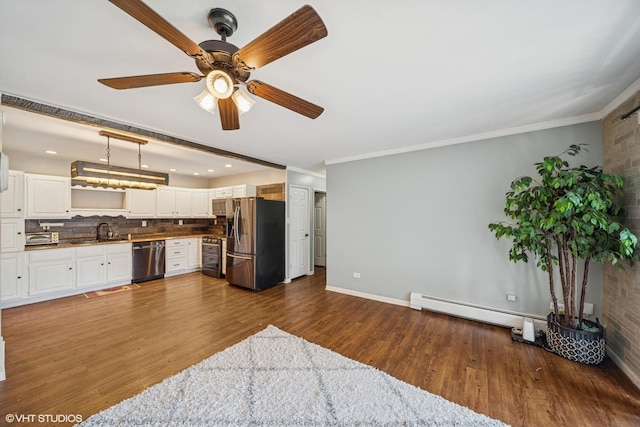 9540 S Mayfield Ave Unit 103S, Oak Lawn, IL 60453 - kitchen featuring stainless steel appliances, tasteful backsplash, white cabinets, dark wood-style flooring, and a baseboard heating unit