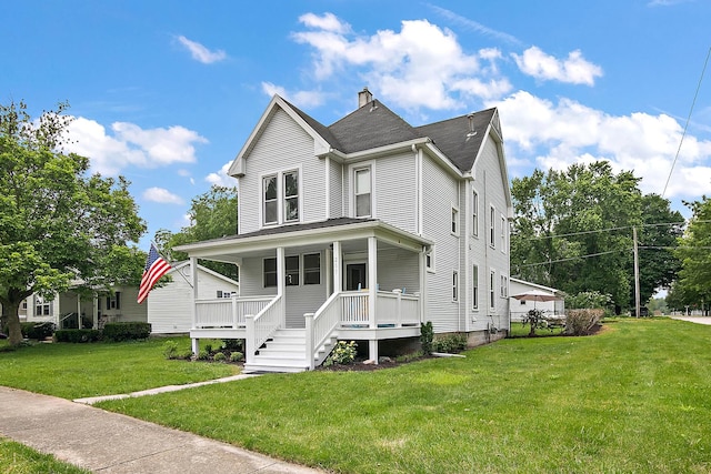 211 N Maple St, Grant Park, IL 60940 - view of front facade with a porch, a chimney, and a front yard
