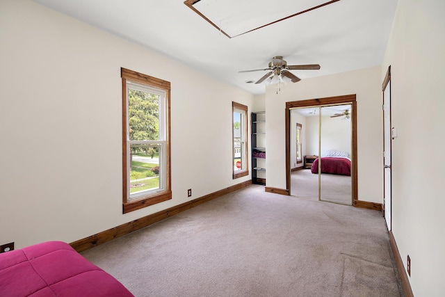 211 N Maple St, Grant Park, IL 60940 - unfurnished bedroom with attic access, carpet floors, baseboards, and a closet