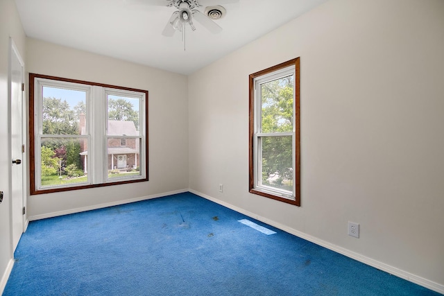 211 N Maple St, Grant Park, IL 60940 - carpeted empty room featuring baseboards and ceiling fan