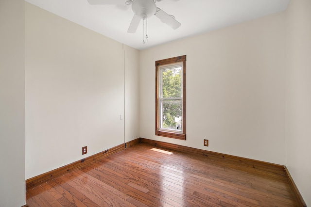 211 N Maple St, Grant Park, IL 60940 - empty room featuring wood-type flooring, baseboards, and a ceiling fan