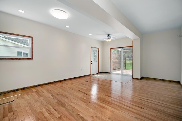 211 N Maple St, Grant Park, IL 60940 - unfurnished room with baseboards, light wood finished floors, ceiling fan, and recessed lighting