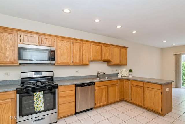 810 Braeman Ct, Libertyville, IL 60048 - kitchen with appliances with stainless steel finishes, a peninsula, light tile patterned floors, and recessed lighting