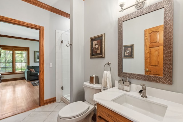2188 Inverray Rd, Inverness, IL 60067 - bathroom with vanity, tiled shower, toilet, baseboards, and ornamental molding