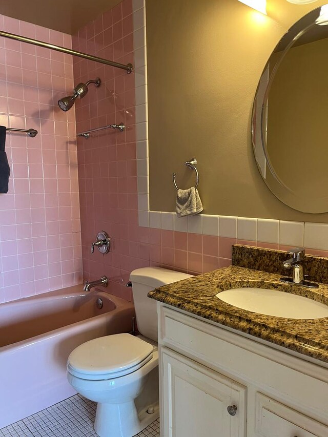 165 N Kenilworth Ave Unit 4D, Oak Park, IL 60301 - full bath featuring tile walls, vanity, shower / washtub combination, tile patterned flooring, and toilet