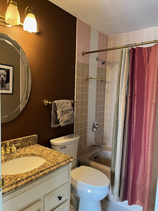 165 N Kenilworth Ave Unit 4D, Oak Park, IL 60301 - bathroom featuring vanity, shower / bath combination with curtain, toilet, and tile patterned floors