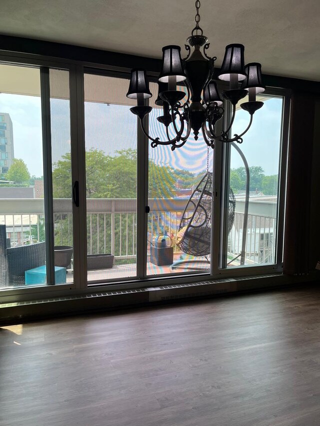 165 N Kenilworth Ave Unit 4D, Oak Park, IL 60301 - detailed view of a chandelier and wood finished floors